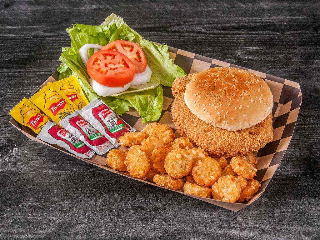 Suburban Tenderloin · Hand breaded pork tenderloin with lettuce, onion, tomato ketchup and mustard served with a side of Time Tots