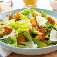 Caesar Salad  · Green salad with Caesar dressing and cheese. 