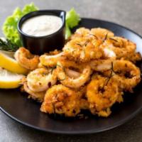Fried Calamari · Crispy squid battered and fried to perfection.