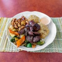 Hibachi Steak and Chicken Combo · Beef steak and poultry cooked on a hibachi grill.