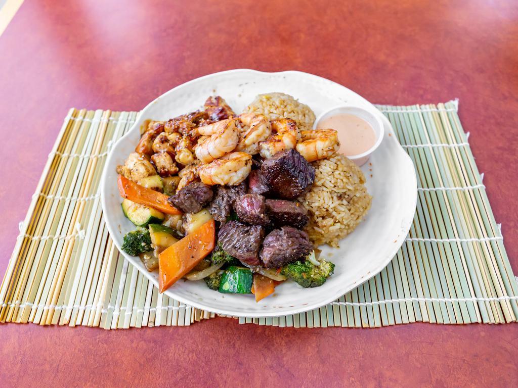 Hibachi Steak, Chicken and Shrimp Trio · Beef steak, poultry and shell fish cooked on a hibachi grill. Served with fried rice, hibachi vegetables and yum sauce. Hibachi vegetables consist of carrots, zucchini, onions and broccoli. Substitute cauliflower rice or noodle for an additional charge.