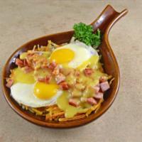 Benedict Skillet · Hash browns topped with 2 eggs and diced, grilled Canadian bacon, topped with our own hollan...