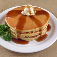 Hot Cakes · 3 hotcakes served with warm syrup.