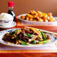 Mongolian Beef · Served with white rice. Hot and spicy. 