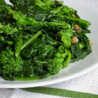 Broccoli Rabe  · Garlic and oil. 