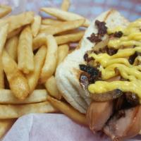 Texas Tommy Sandwich · Jumbo hot dog, bacon, onions and cheese sauce.