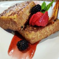 Tres Leches French Toast · served with seasonal berries