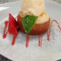 Butter Cake · Served with vanilla ice cream