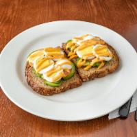 Avocado Toast · Toasted 9-grain bread, avocado spread, tomato, hard boiled egg, Sriracha aioli.