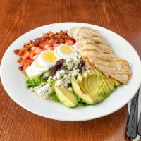 Cobb Salad · Mixed greens, chicken, bacon, hard boiled eggs, avocado, tomato, bleu cheese, ranch dressing.