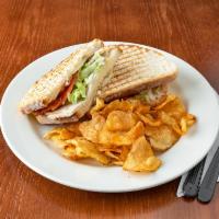 Turkey Panini · Turkey, bacon, tomato, provolone, mayo.