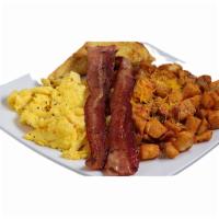 Cowboy Breakfast · 2 eggs served on garlic golden potatoes bed with cheddar cheese, bacon, onions, and half TX ...