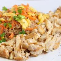 Chicken Lishus · Boneless chicken breast, over egg fried rice, caramelized onions, corn, pepper, shredded car...