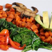 Veggie Paradise · Portobello mushroom with seared sweet potatoes, on a bed of sauteed spinach, roasted peppers...