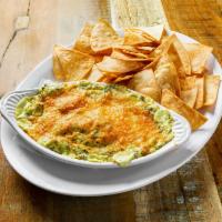 Spinach Dip · Provolone, creme cheese, and Parmesan blended with fresh spinach and marinated artichokes se...