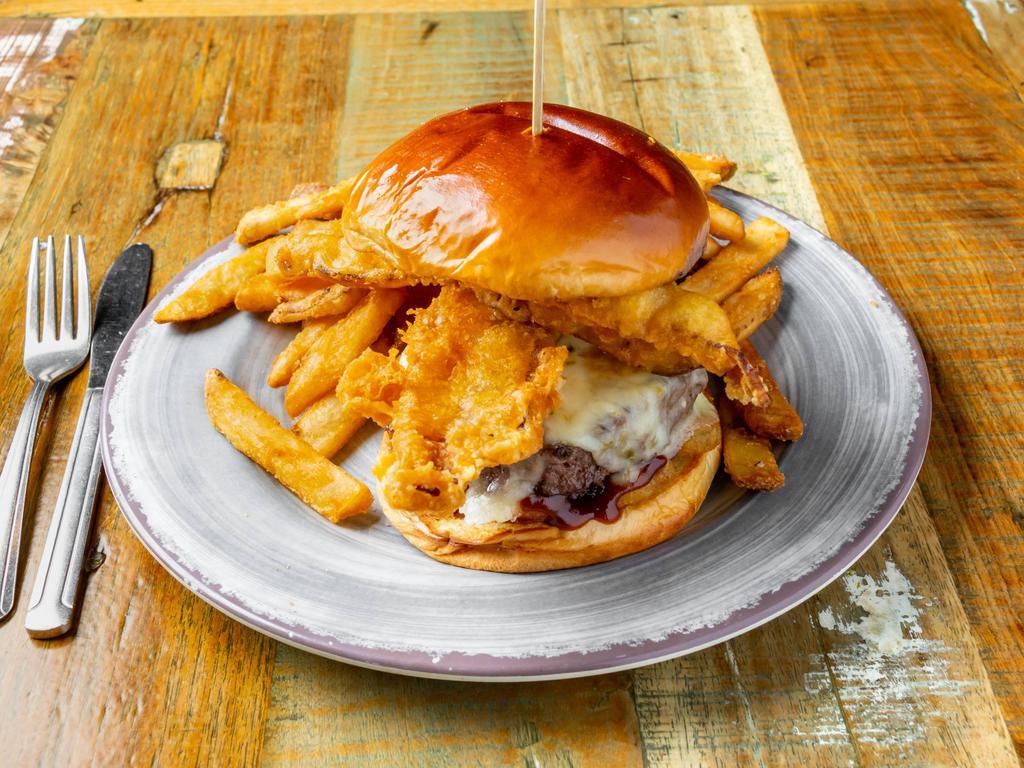 Whiskey Beer Burger · 1/2 lb. Certified Angus beef burger served on a cream ale bun topped with pepper jack cheese, beer-battered bacon, whiskey barbecue sauce, and beer-battered jalapenos.