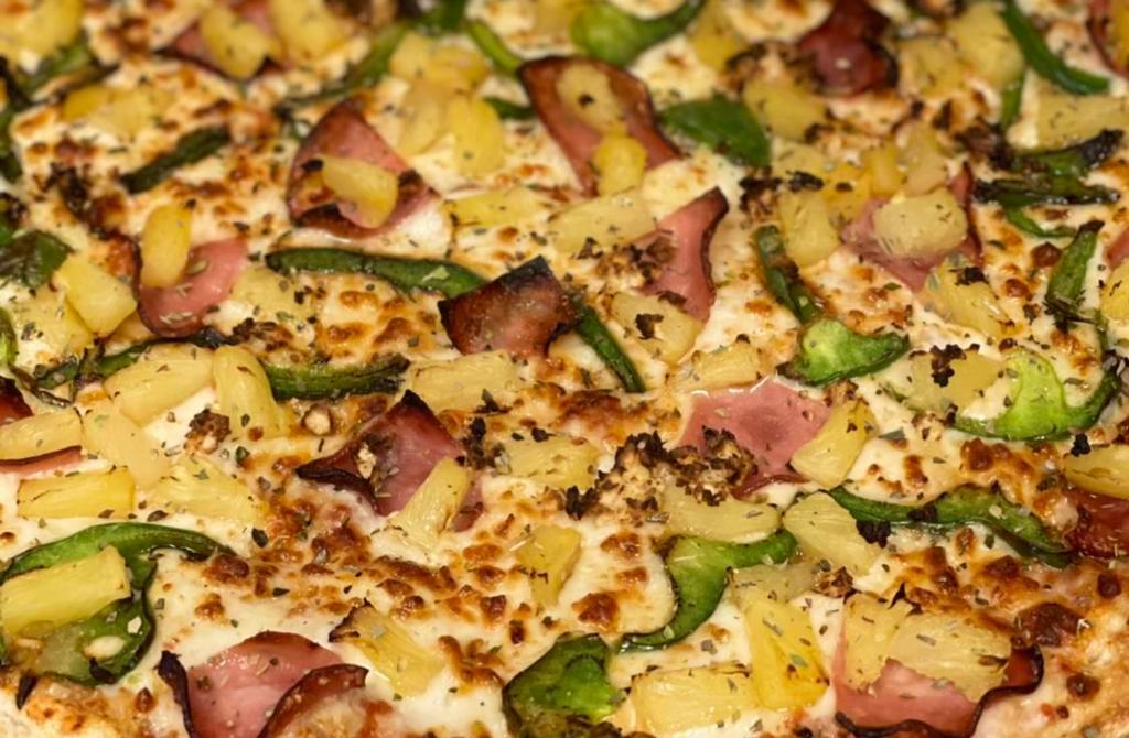 Hawaiian Pizza · Ham, pineapple, green pepper and garlic.  