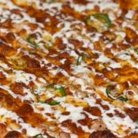 Southwest Chicken Pizza · chicken breast, cheddar cheese, jalapeno with a ranch drizzle