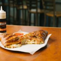 Calzone · Stuffed with ricotta and mozzarella cheeses and baked golden brown.  