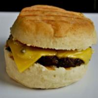 Breakfast Slider · American cheese and sausage on a fresh biscuit. Add 1 of these to your morning danish or muf...