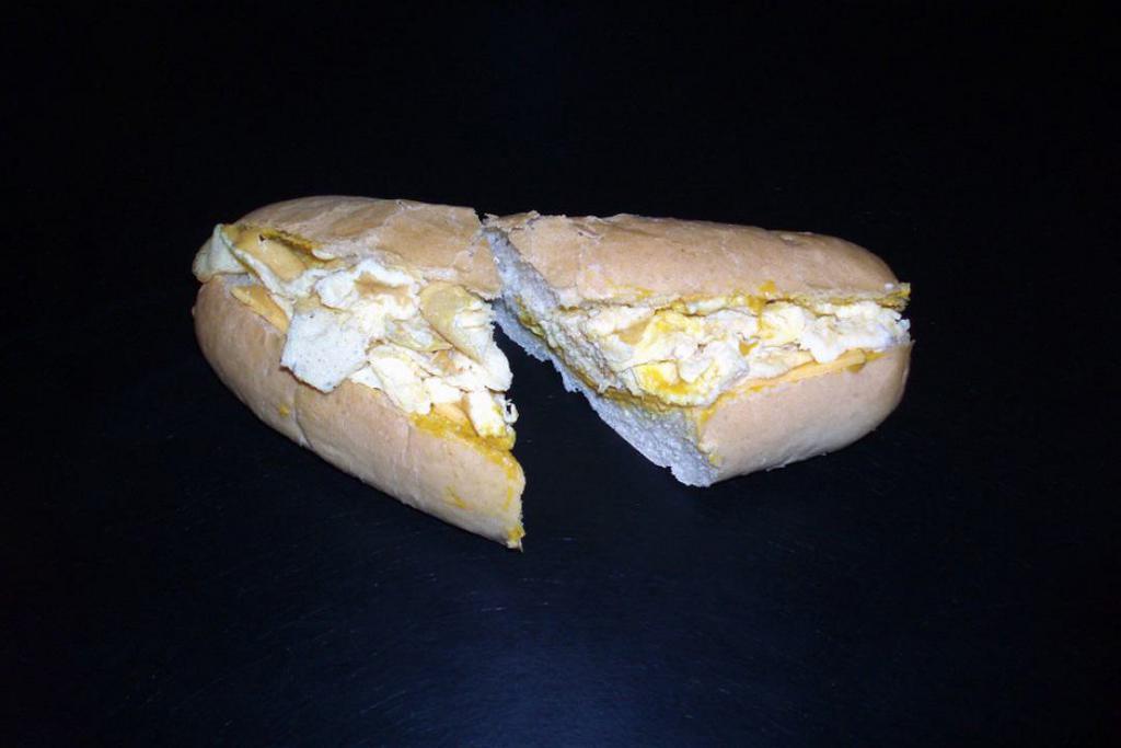Scrambled Egg Sandwich · A classic scrambled egg sandwich with cheese.
