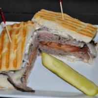 Beefeater Sandwich · Sliced roast beef, provolone cheese, tomato, sliced red onions, dressed with horseradish sau...