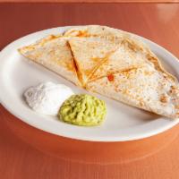 Meat Quesadilla · Large Flour Tortilla Stuffed With With Melted Cheese, Your Choice of Meat, Pico De Gallo, On...