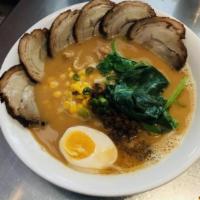 Curry Ramen · Miso curry-based beef bone broth topped with bean sprouts, corn, menma, ground pork, spinach...
