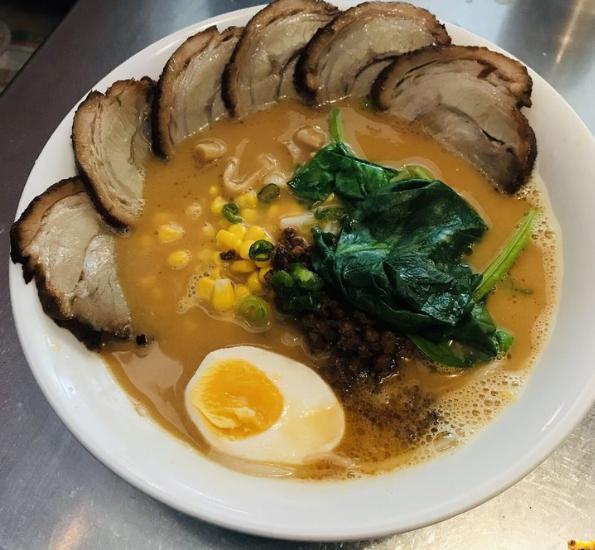 Curry Ramen · Miso curry-based beef bone broth topped with bean sprouts, corn, menma, ground pork, spinach and scallions.