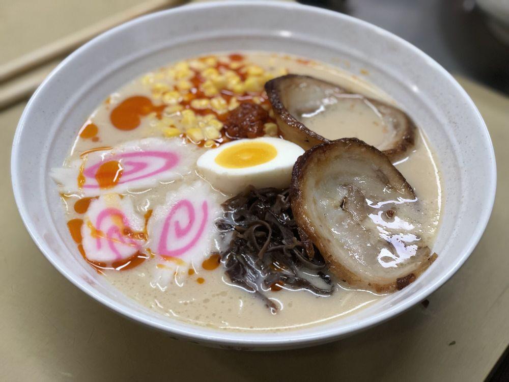 Spicy Tonkotsu Ramen · Miso-based tonkotsu broth topped with chashu pork, naruto, mushroom and spicy hot oil.