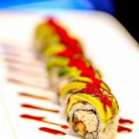 DRAGON ROLL · Eel and cucumber topped with avocado , tobiko , and eel sauce.