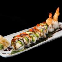 King Dragon Roll · Shrimp tempura, cucumber, topped with eel, avocado, red tobiko and eel sauce.