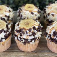 Banoffee Cupcakes · Rich banana cake baked with mini chips, filled with house-made caramel, frosted in mascarpon...
