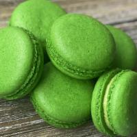 Pistachio Macarons · Pistachio shell filled with pistachio Swiss cream.