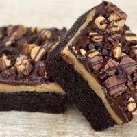 Reese's Peanut Butter Brownie  · Our amazing brownie recipe layer with Reese's peanut butter ganache, chocolate ganache, Rees...