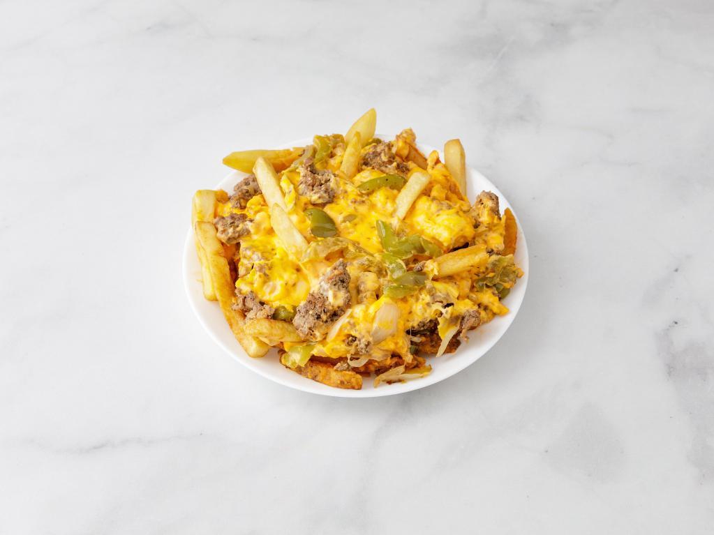 10. Dublin Taco Fries · French fries, ground beef, chopped onions, peppers, shredded cheese and special sauce.