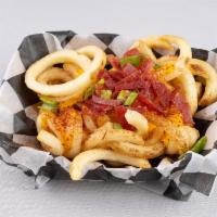 3. Texas Cheese Fries Fry Basket · Drizzled cheese, savory bacon, chive and chili powder.