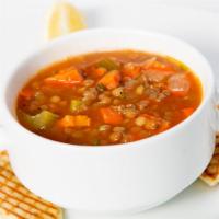 Lentil Soup · A traditional vegetarian blend of lentils, carrots, celery, fresh garlic and onion in a toma...