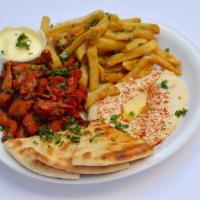 Chicken Shawarma Entree · Tender pieces of chicken marinated in Mediterranean spices served with hummus and lemon aioli.