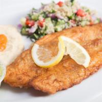 Fish Entree · Fried to perfection and served with a garlic herb aioli and coleslaw.