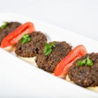 Falafel Entree · Garbanzo beans with fresh herbs and spices, served with tahini. Vegetarian.