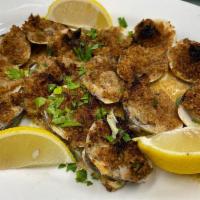 Clams Oreganata · Whole baked littleneck clams.