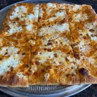 Grandma alla Vodka Pizza · Thin crust square pie topped with our homemade vodka sauce, aged Romano, and mozzarella chee...