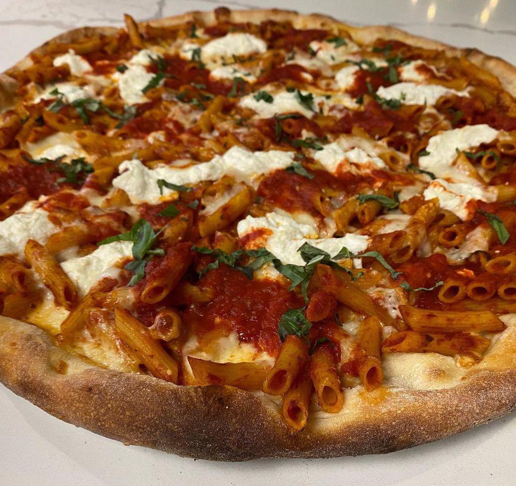 Baked Ziti Pizza · Topped with baked ziti with ricotta, mozzarella, and our tomato sauce.