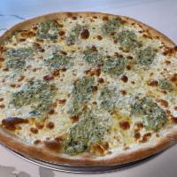Spinach and Artichoke Pizza · Homemade spinach and artichoke cream sauce with fresh mozzarella.