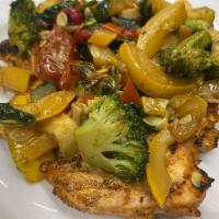 Grilled Chicken Primavera · Grilled chicken marinated with balsamic vinegar topped with fresh vegetables. Gluten-free.