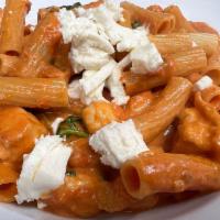 Rigatoni Fiorentina · Fresh diced chicken, spinach, and mozzarella cheese tossed in a creamy pink sauce over rigat...