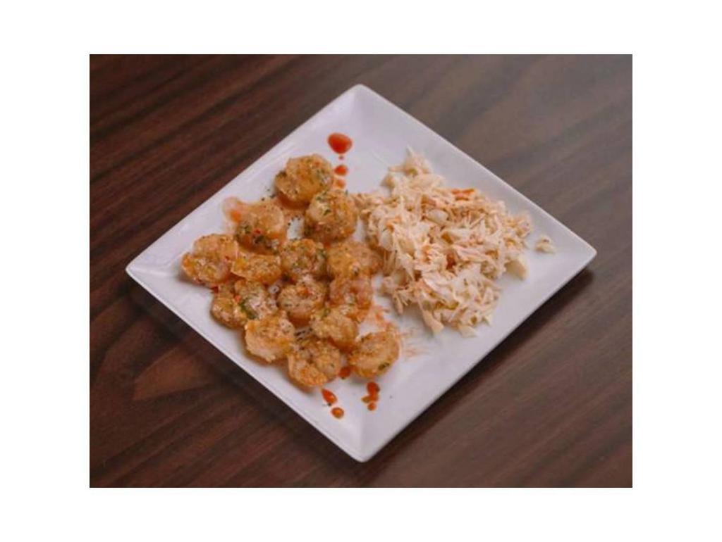 Amplified Shrimp · Lightly fried & tossed with a sweet & spicy sauce.