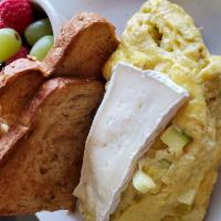 Apple and Brie Omelette · Three egg omelette with sauteed apples and brie cheese. Served with toast and a small side o...