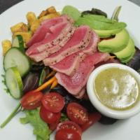 Seared Ahi Tuna Salad · Seared ahi tuna over field greens with tomatoes, croutons, avocado, lime vinaigrette. Please...